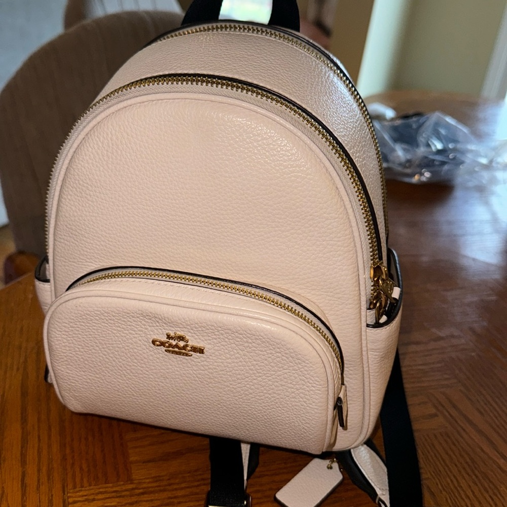 Coach mini backpack. Great condition, minor signs of wear, see last photo.